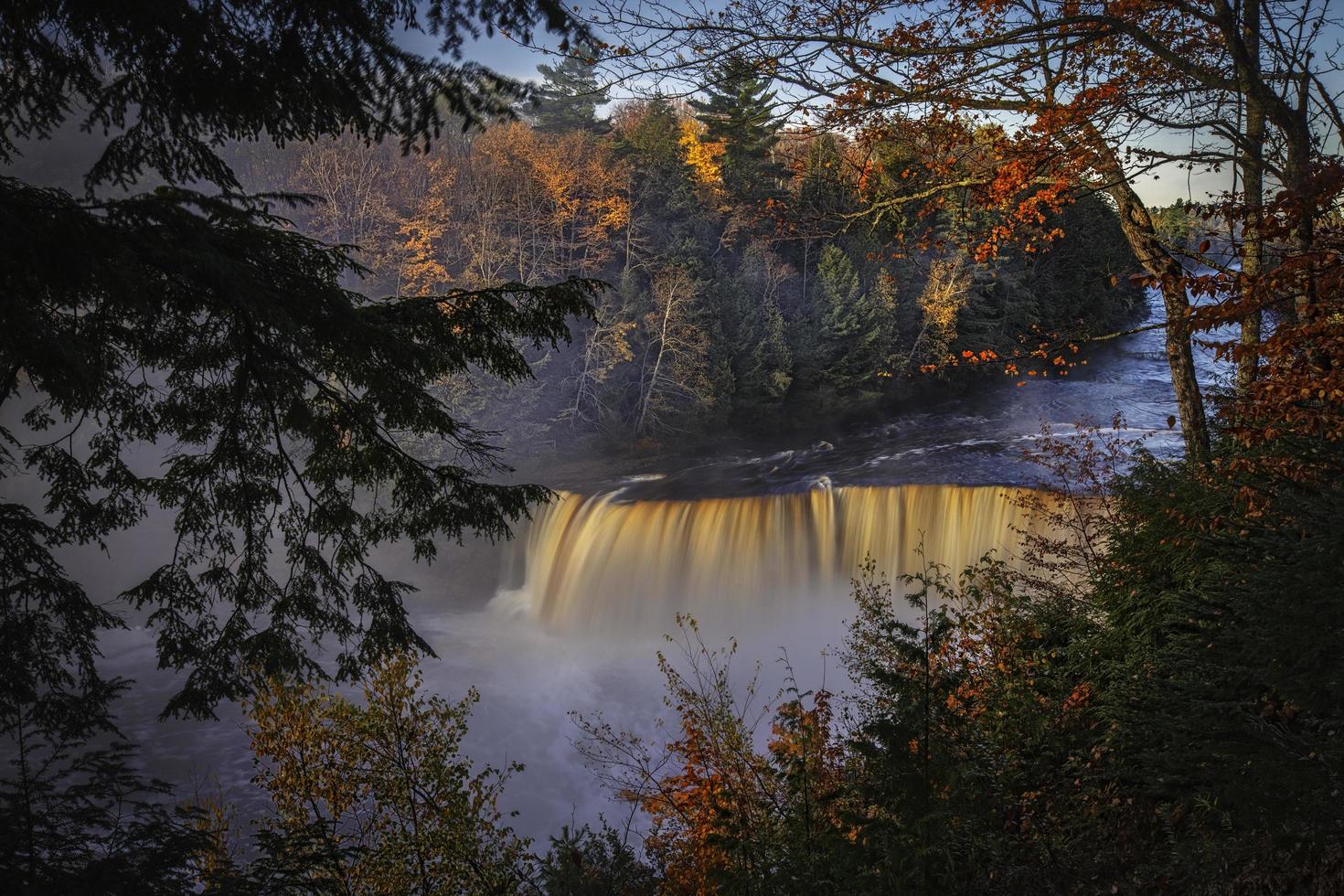 Waterfall surrounded by trees photo