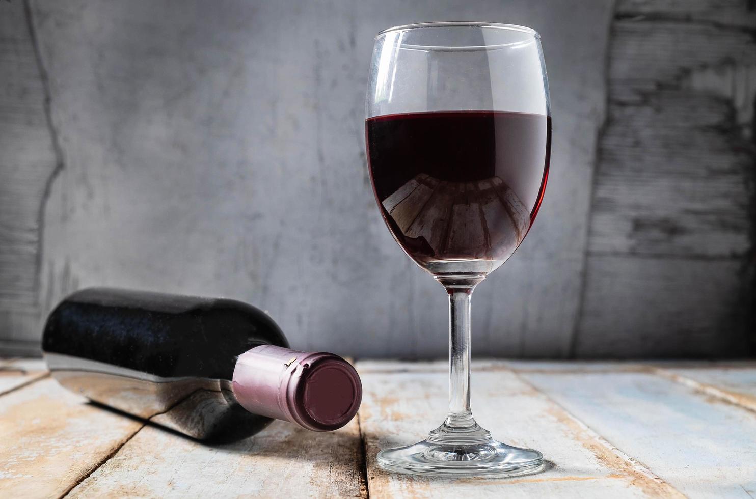 Wine glass and wine bottle  photo