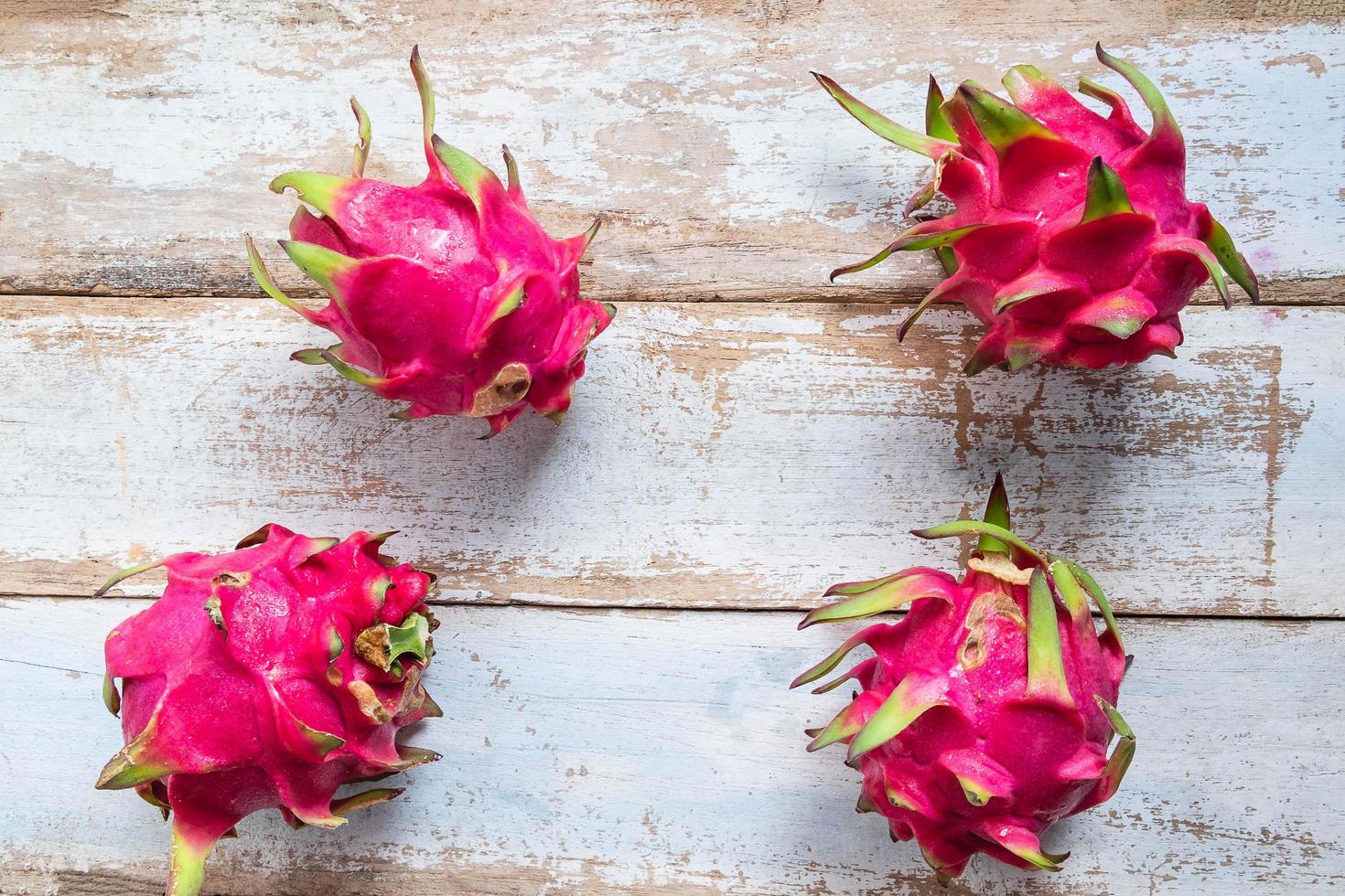 Dragon fruit on wood table photo