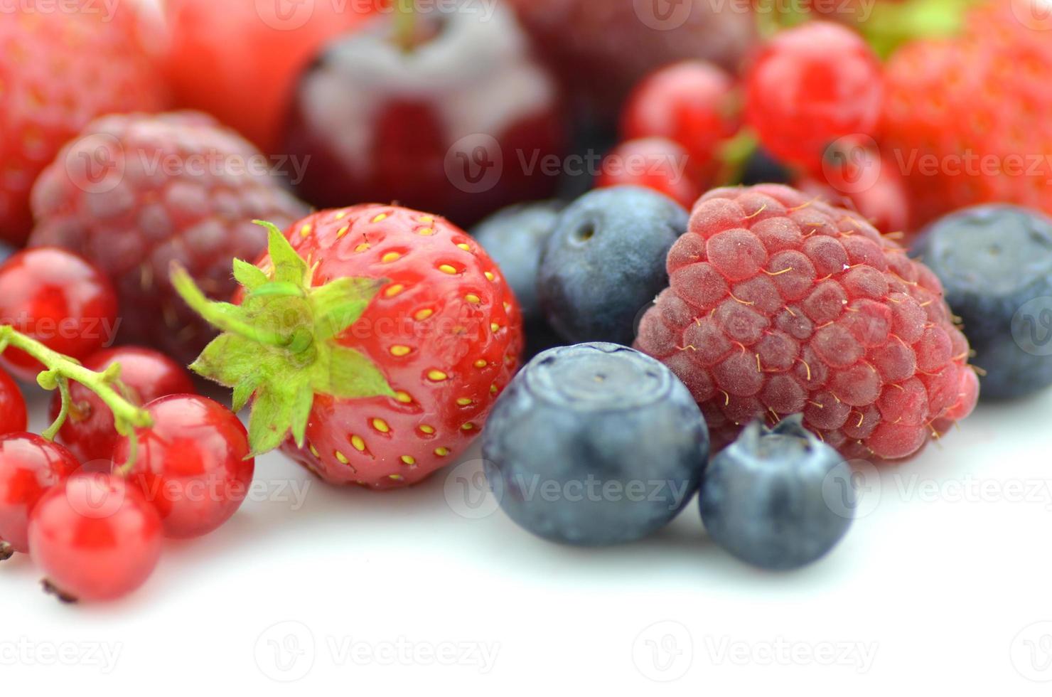 soft fruits strawberries raspberries cherries blueberries currants isolated on white photo