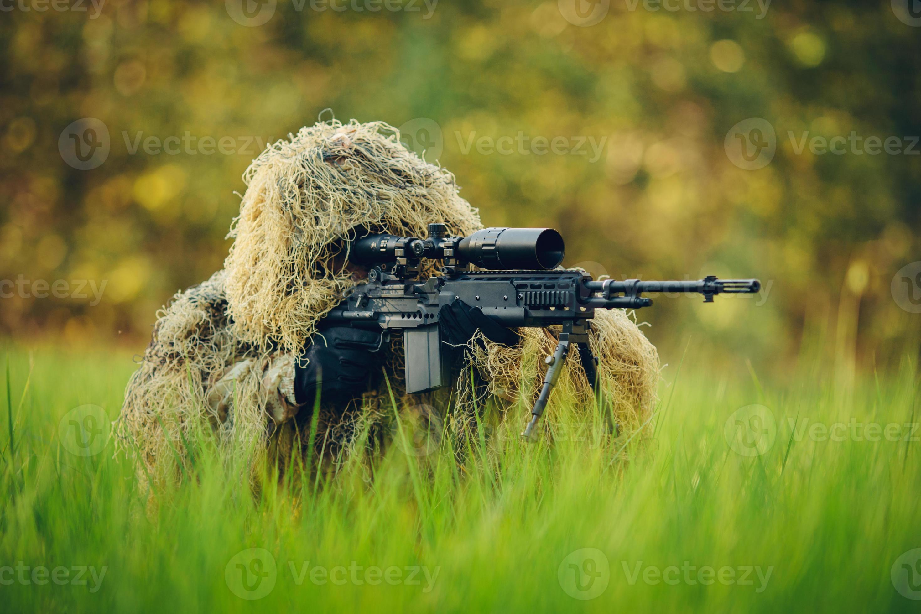 Camouflaged Hunter In Jungle Like Area With Sniper Rifle , He Must Blend  Into Surrounding To Not Be Detected Stock Photo, Picture and Royalty Free  Image. Image 67250301.