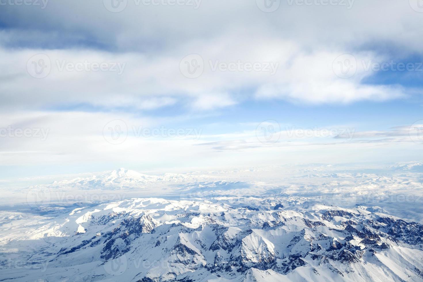 Top of snowy mountain photo