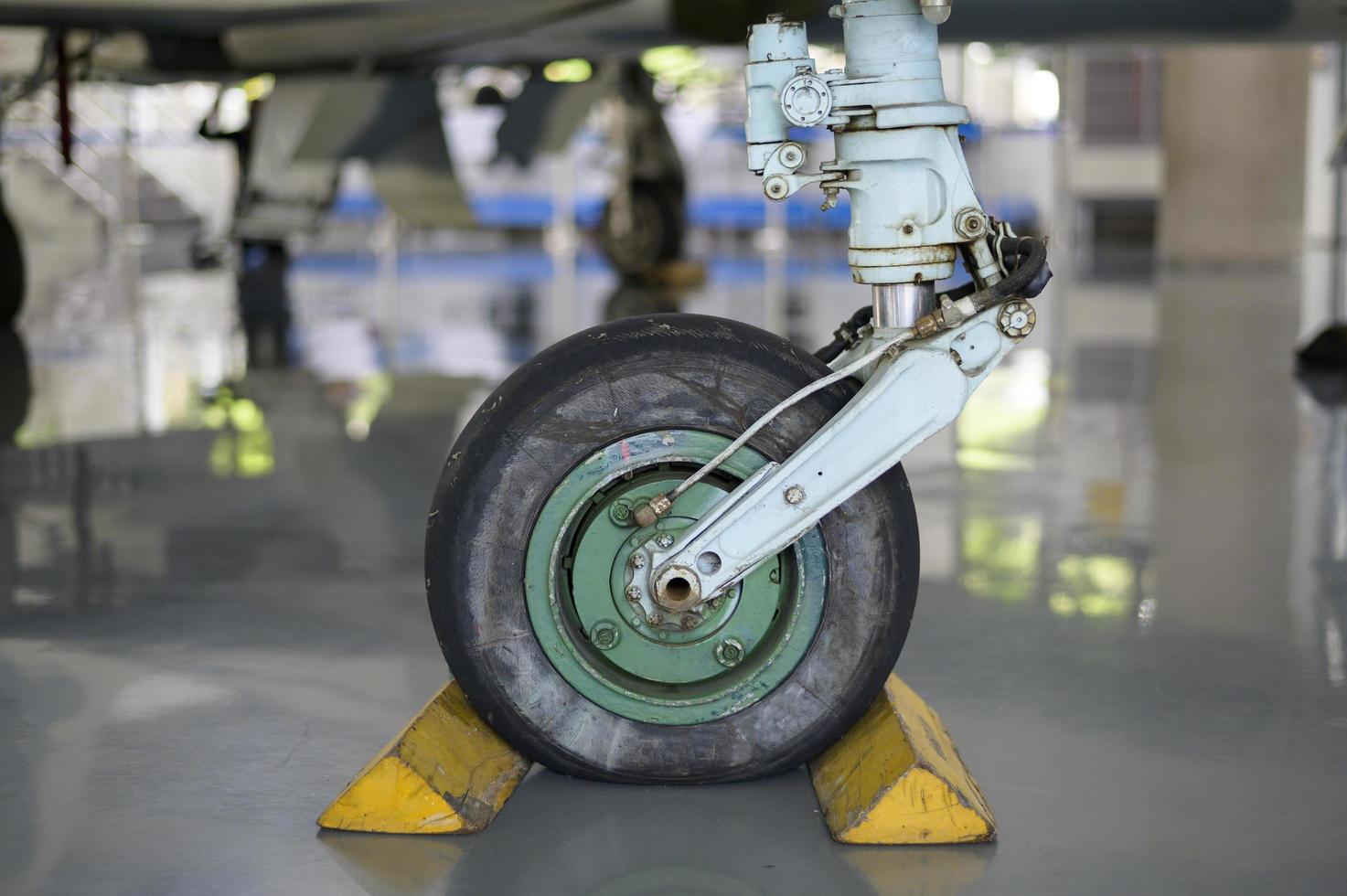 Close up of airplane wheel in an airfield photo