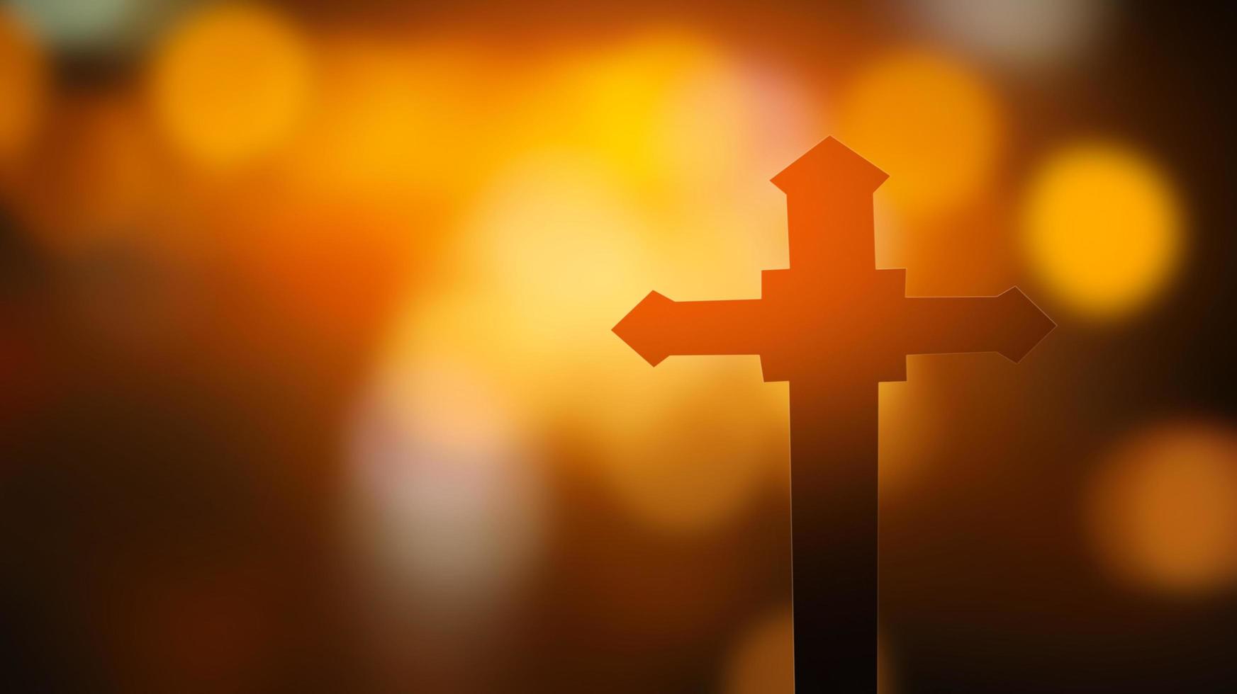 Cross on bokeh background  photo