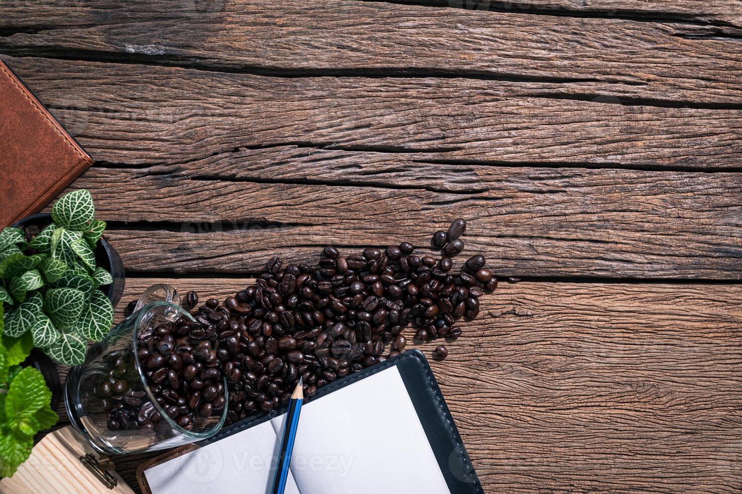 Coffee beans and notebook photo