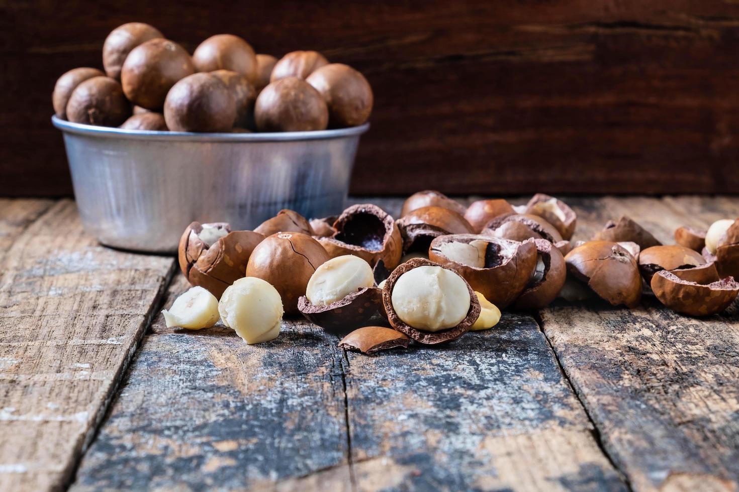 Macadamia nuts with shells  photo