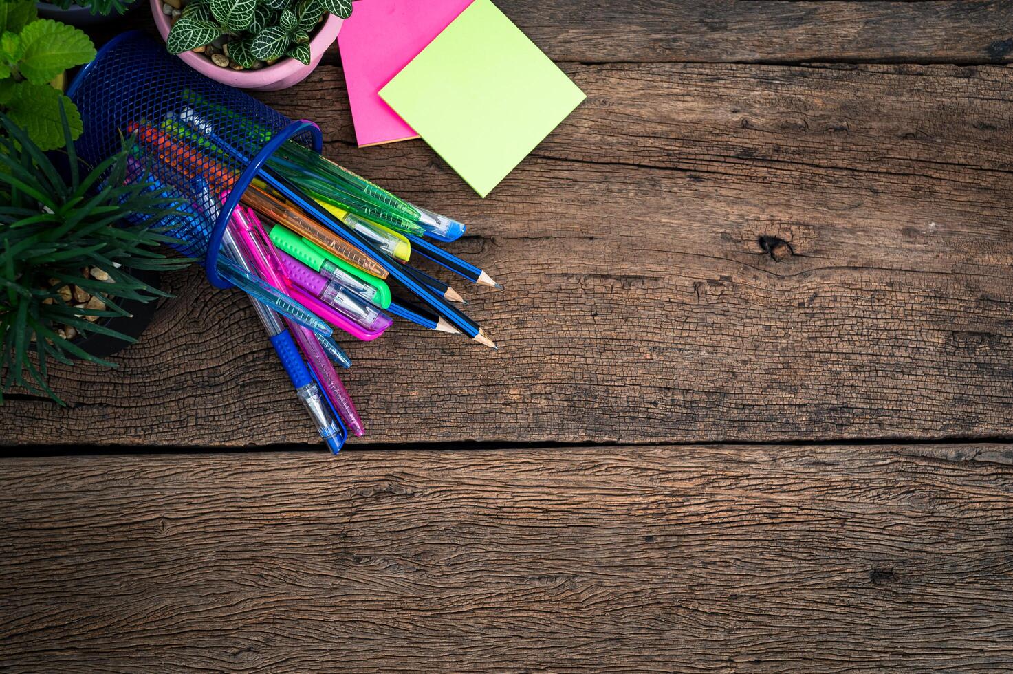 Note paper and stationery on desk top photo