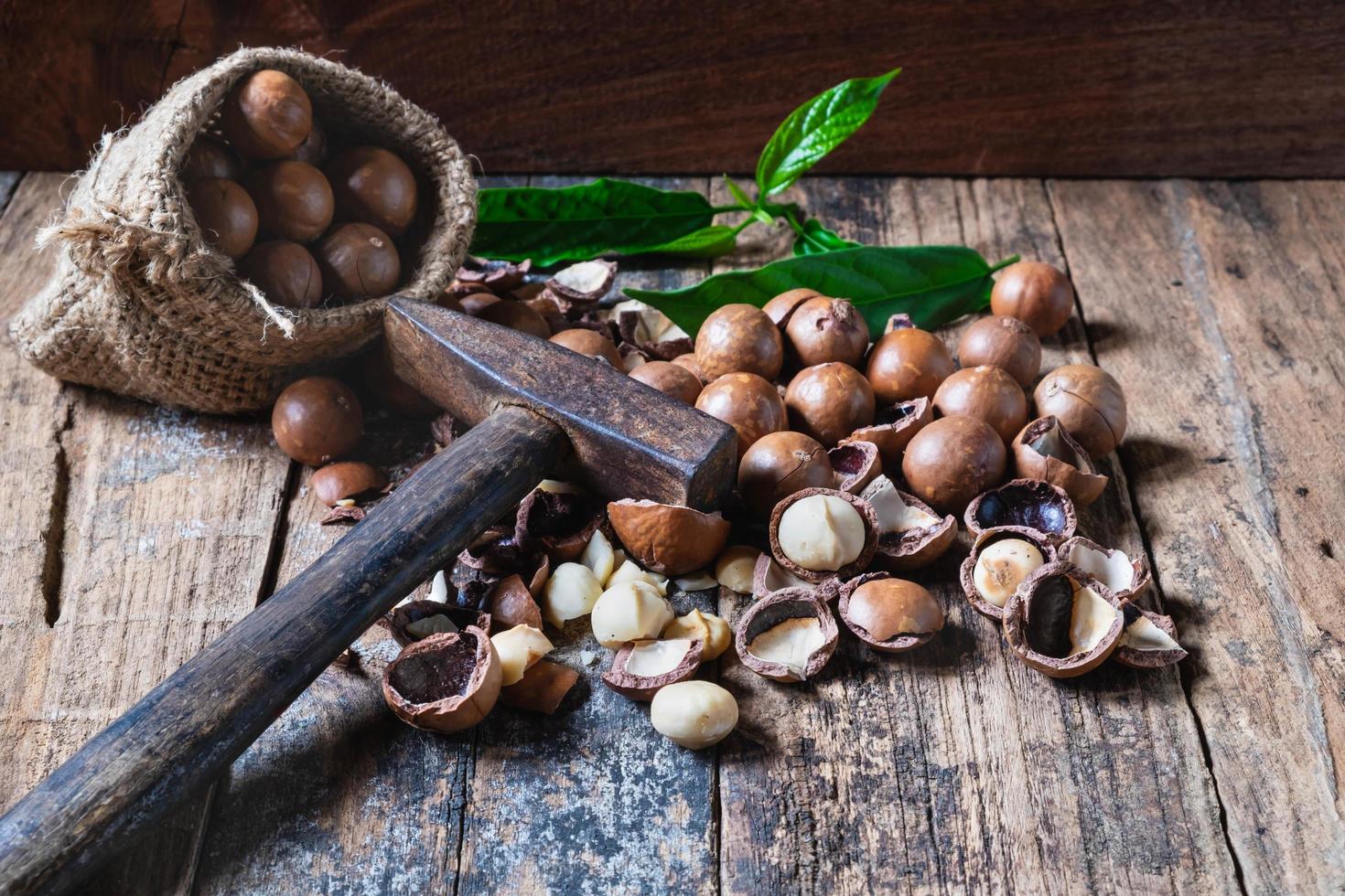 Macadamia nuts on a wooden table photo