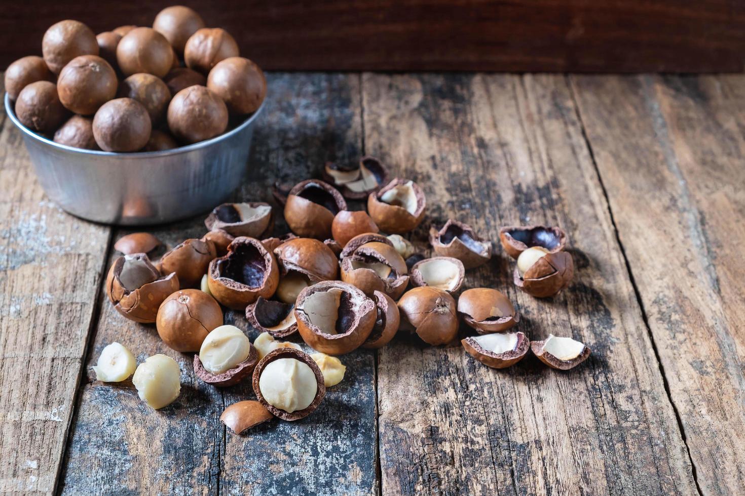 Macadamia nuts with shells  photo