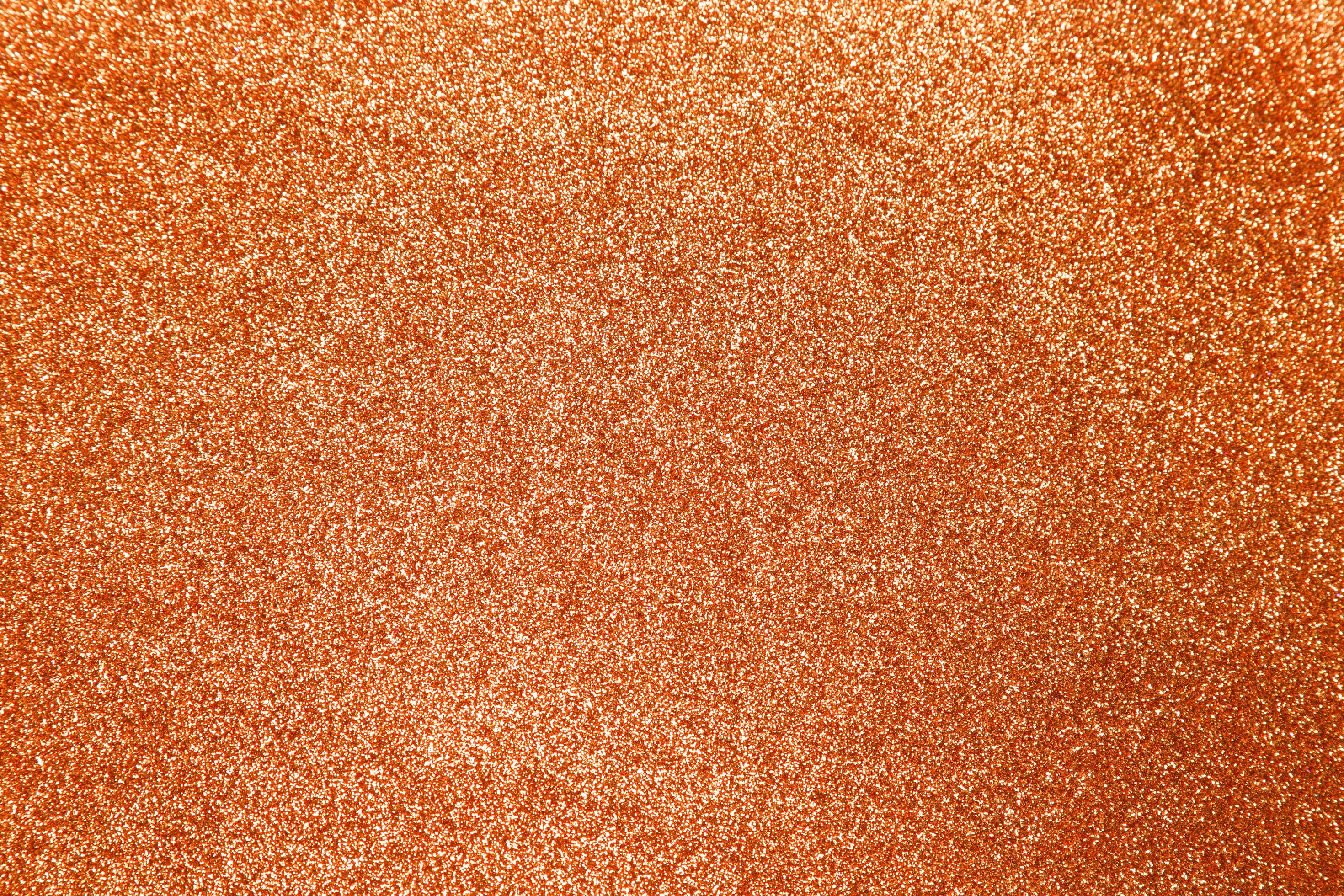 Orange glitter background, shiny texture Stock Vector by