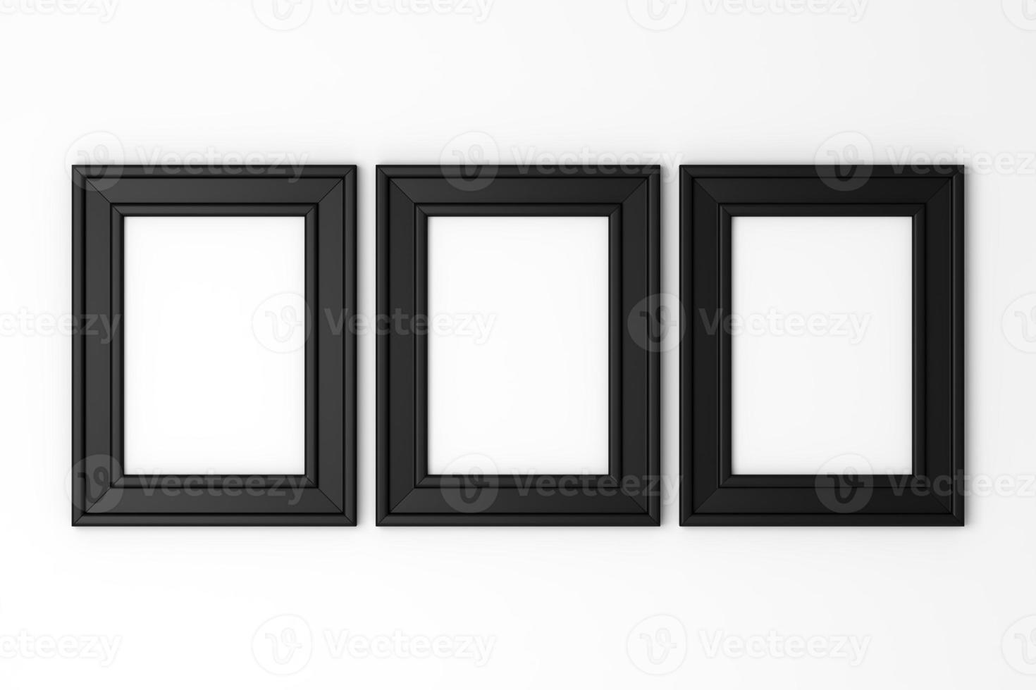 three blank black photo frames on white wall 1346011 Stock Photo at