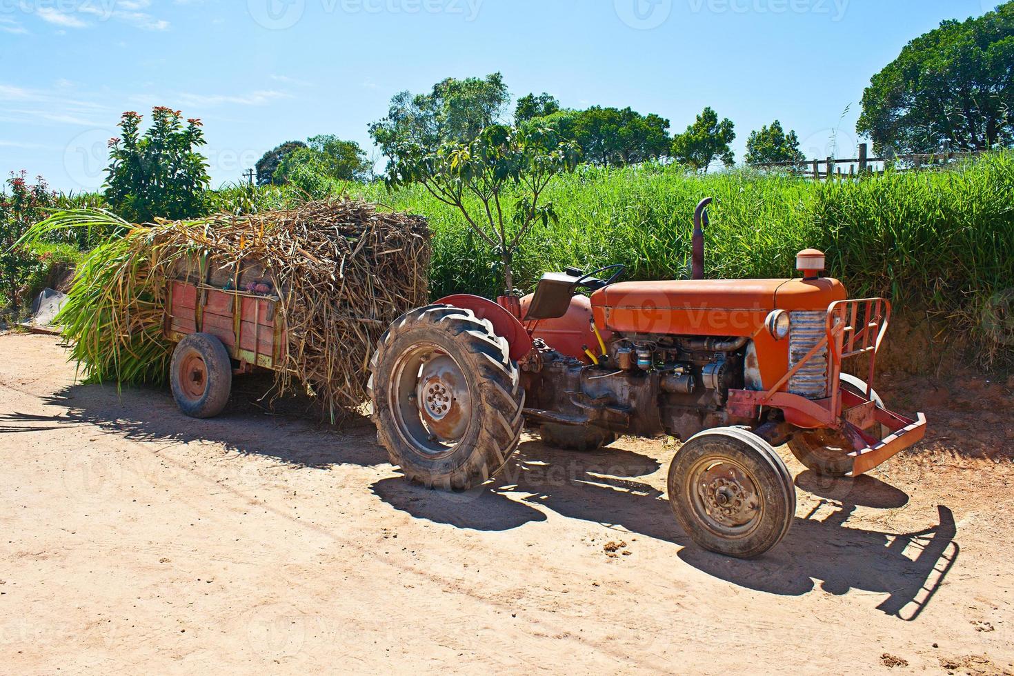 Farm tractor parked photo