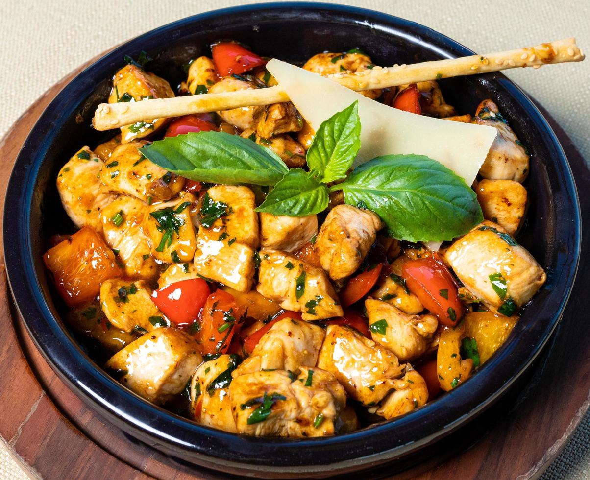 Cooked chicken with tomatoes photo