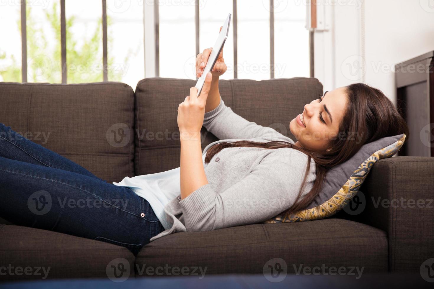 Laying On A Couch And Reading Stock Photo Laying On A Couch And Reading Stock Photo