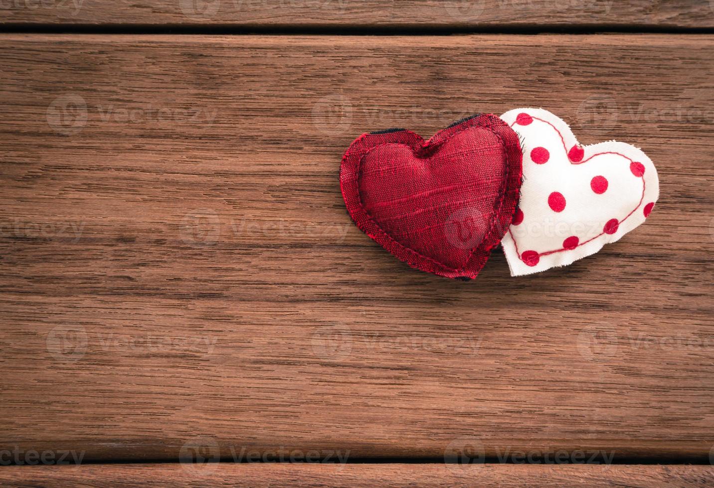 Amor corazones dulce San Valentín y textura de madera foto