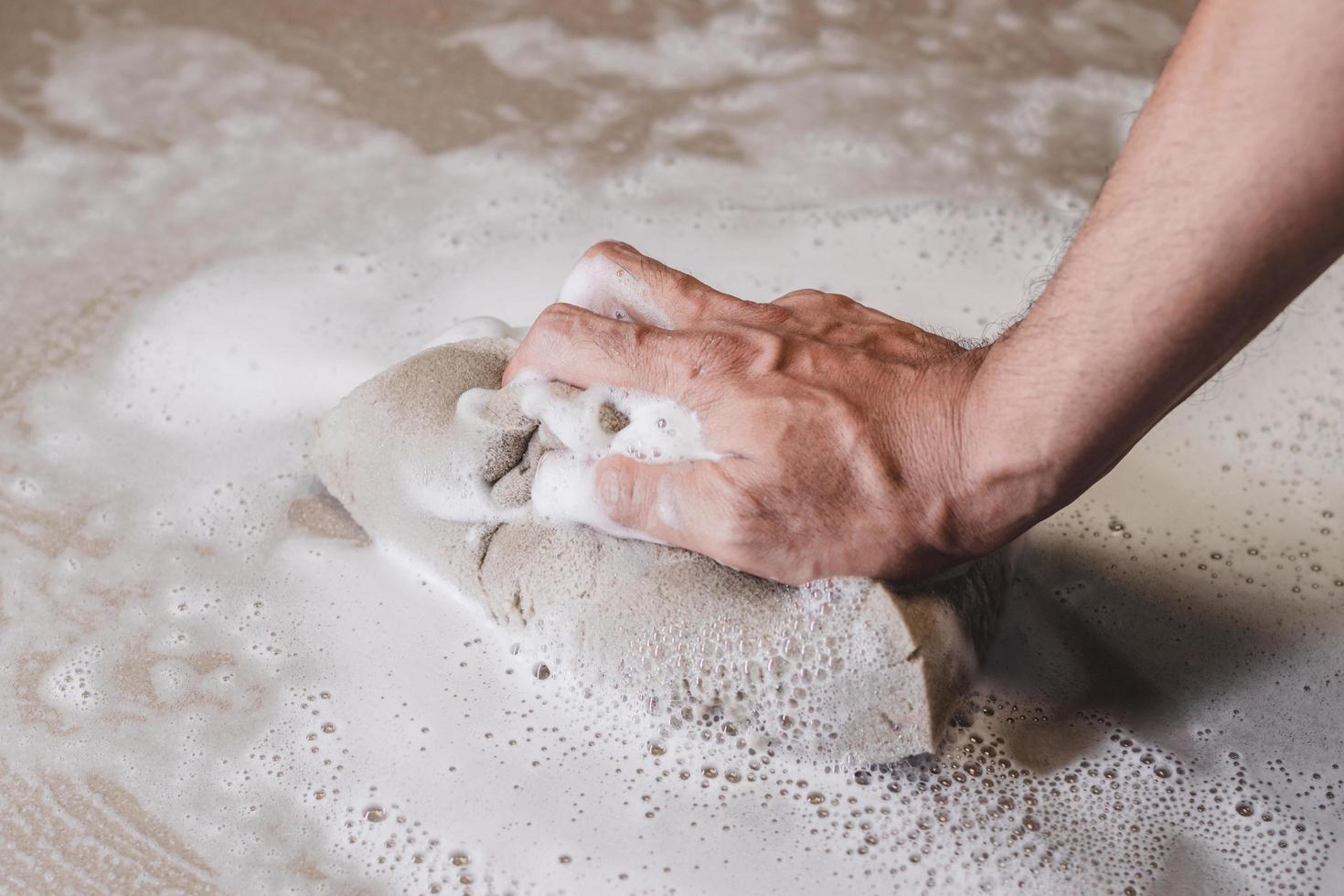 Cleaning the tile floor photo