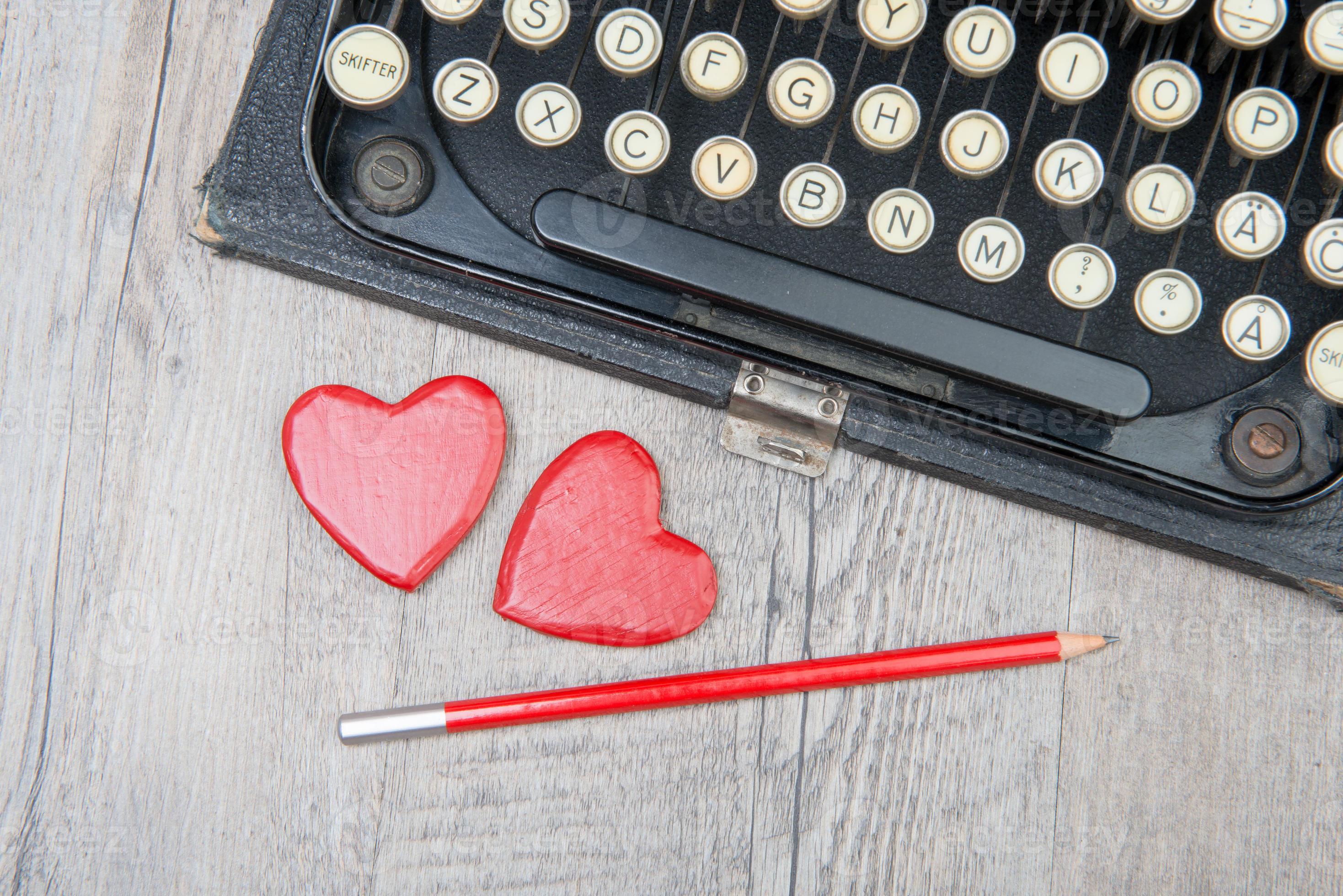 Old typewriter with love heart 1364566 Stock Photo at Vecteezy