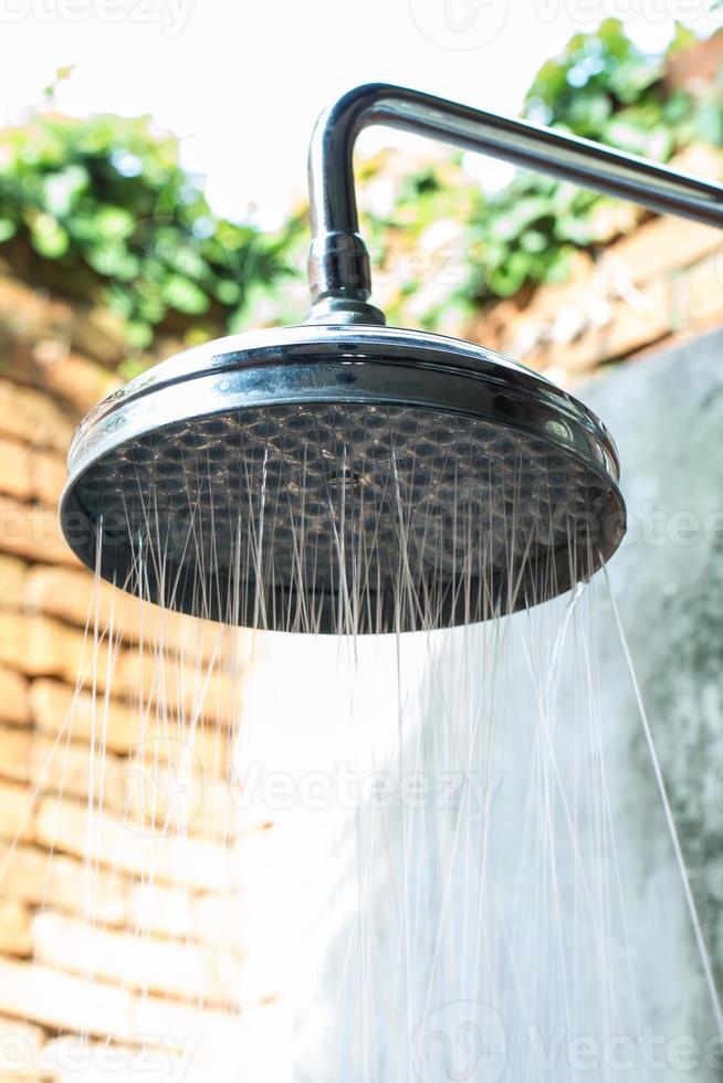 Shower with water stream photo