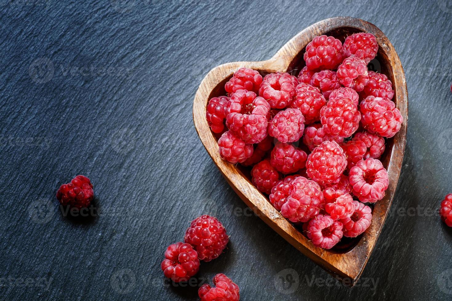 Fresh raspberries in a bowl photo