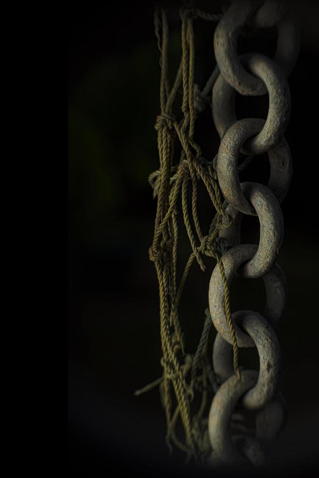 Rust chain in a black background photo