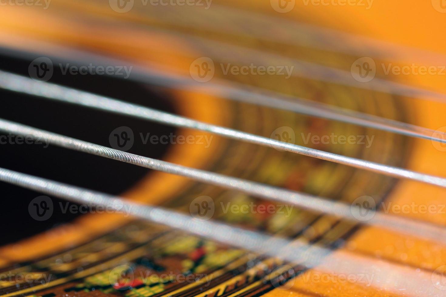 Close up of guitar strings photo