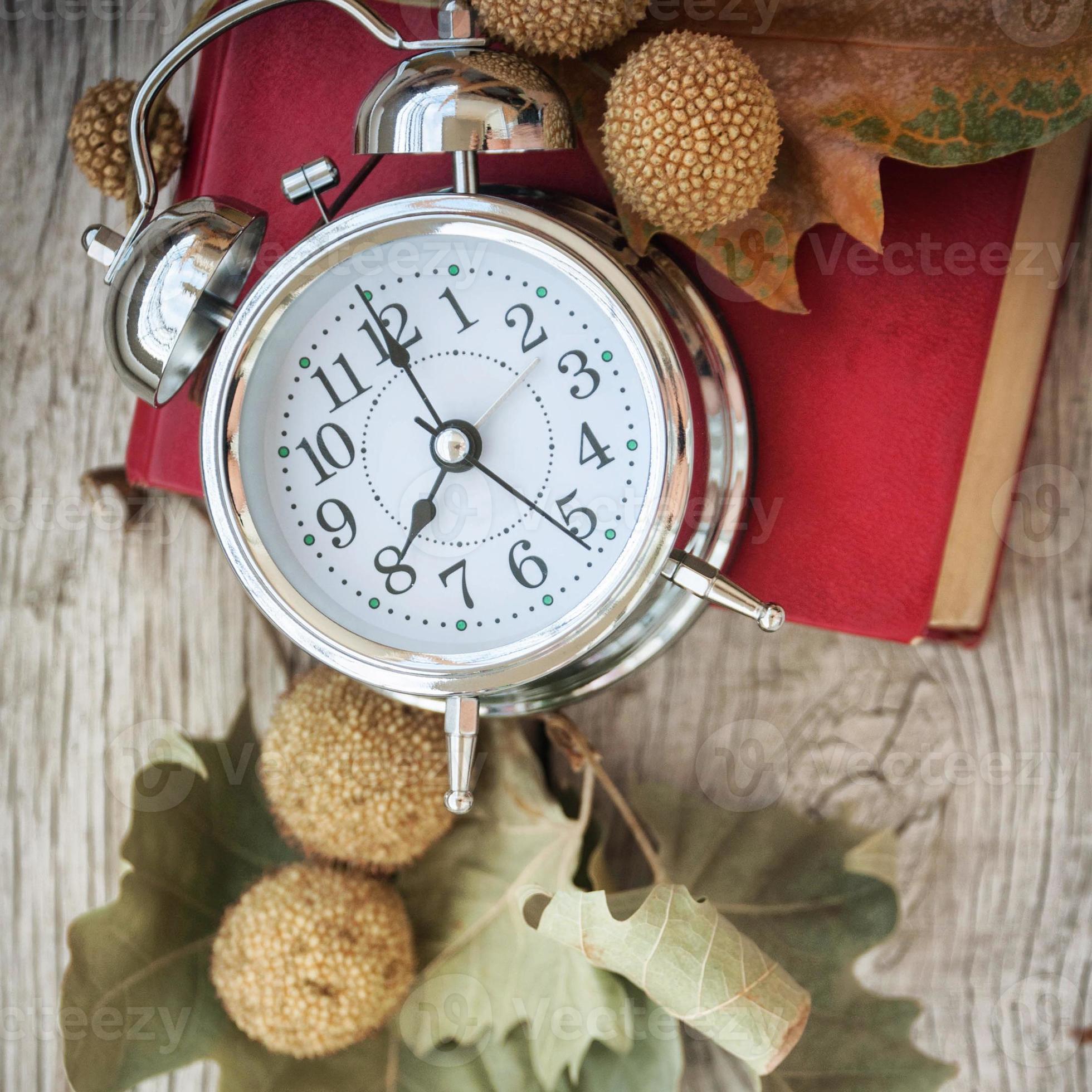 Clock with books 1373701 Stock Photo at Vecteezy