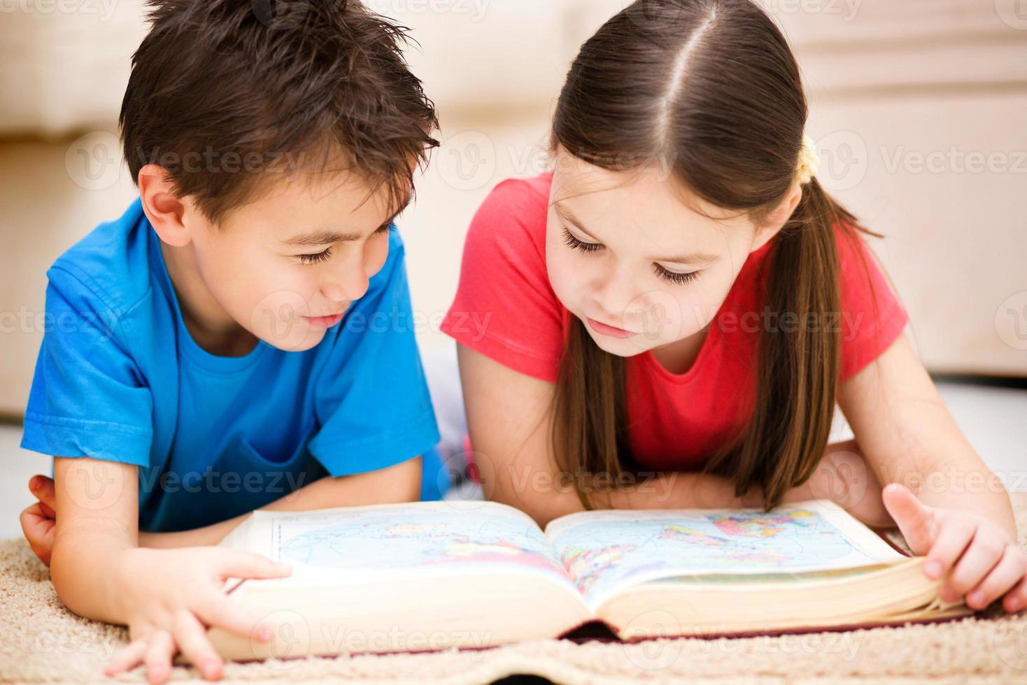 Children is reading book photo