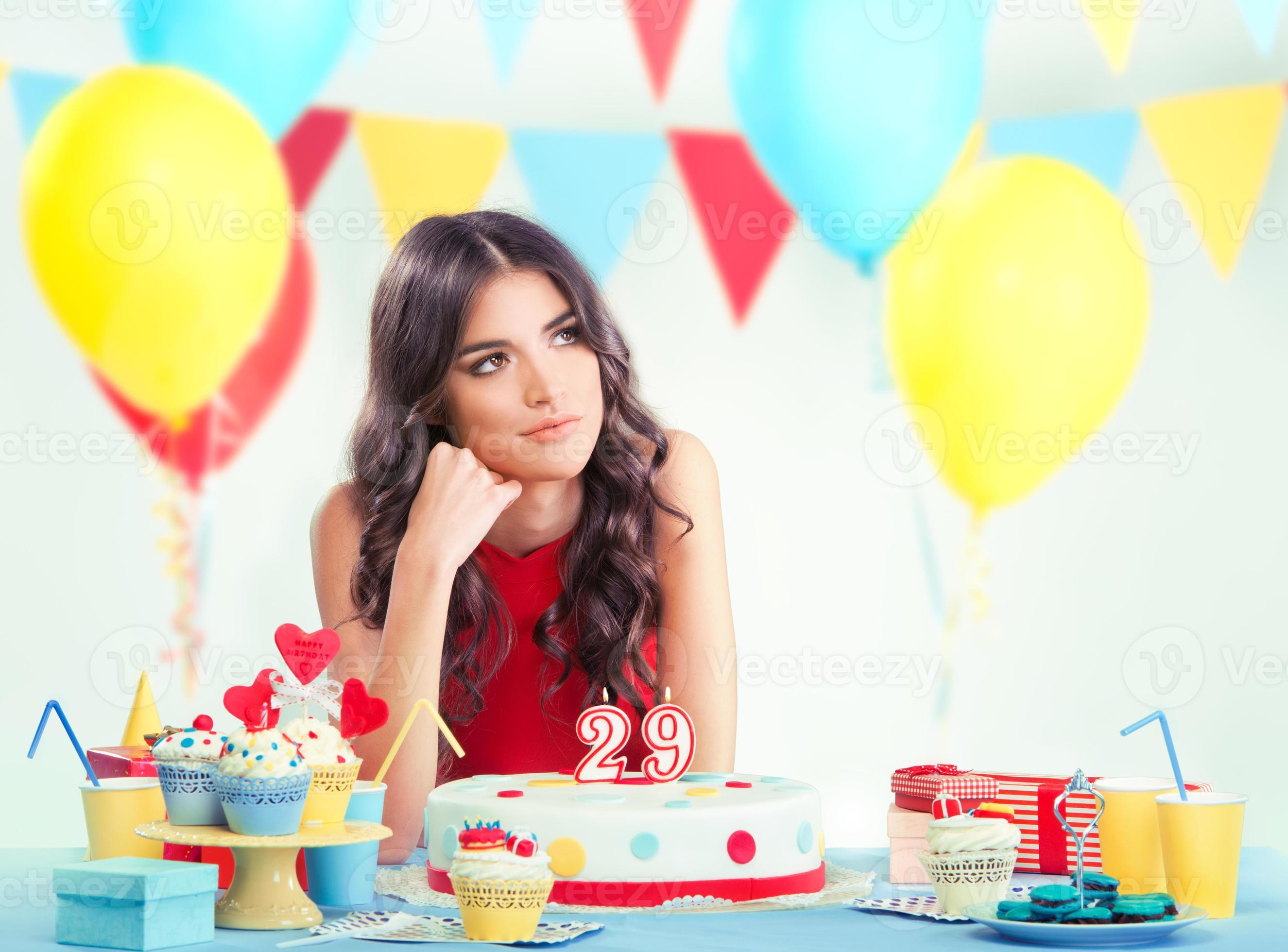 Beautiful Woman At Her Birthday Party Thinking 1375463 Stock Photo At Vecteezy