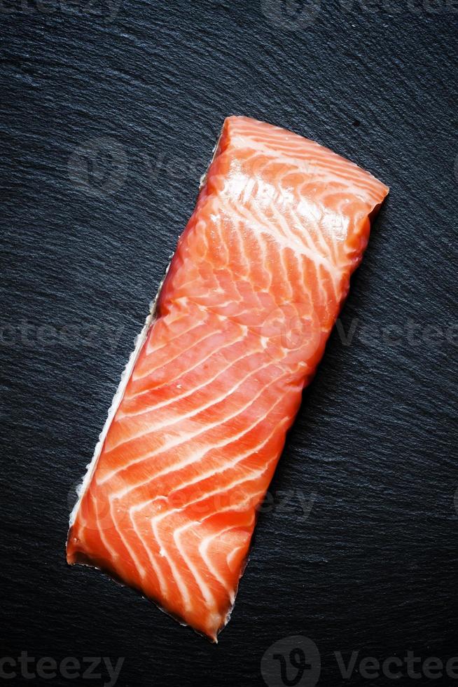 Fillet of salty salmon with spicy pepper and sea salt photo