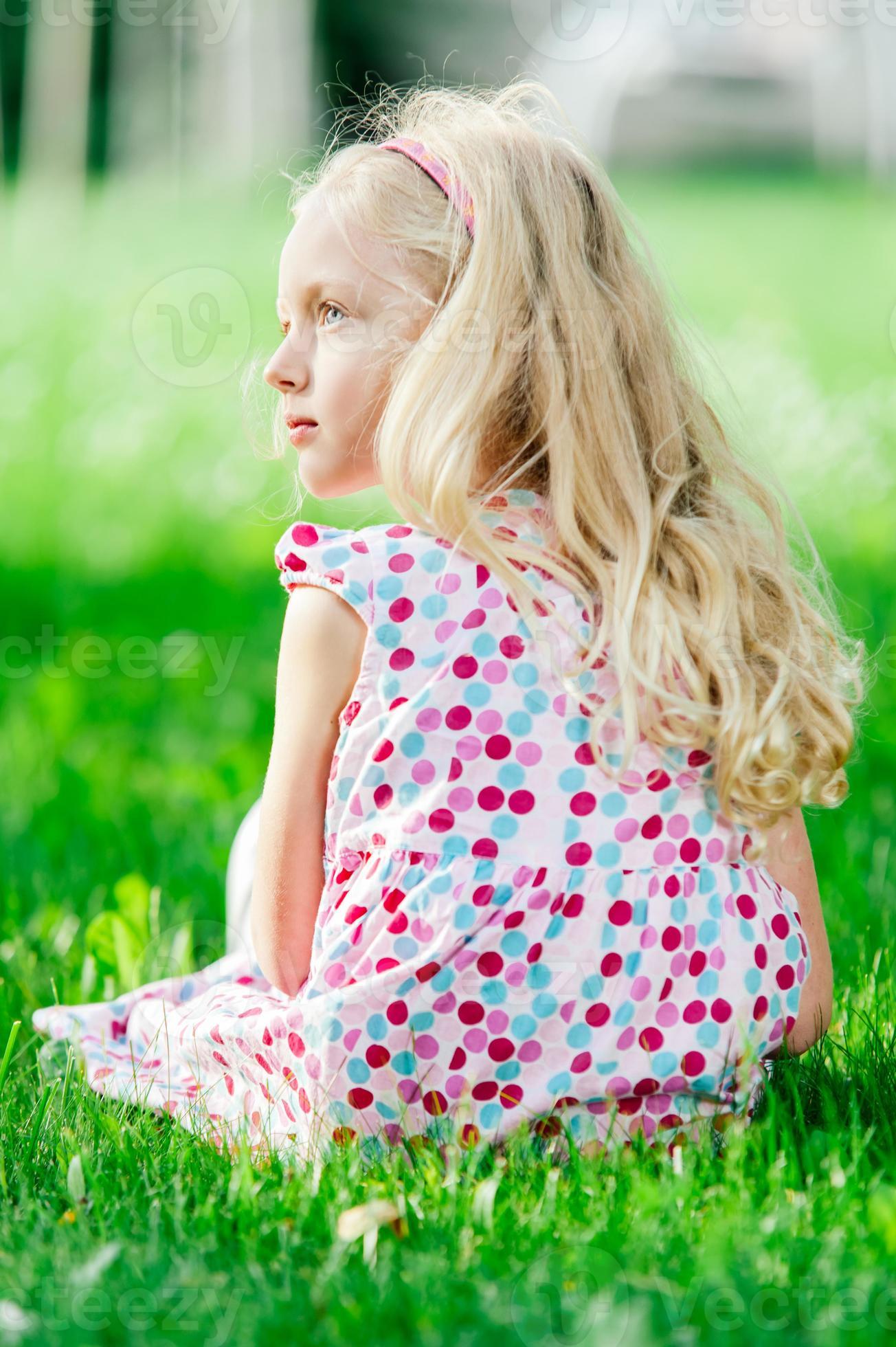 Portrait Of Cute Little Blonde Girl Stock Photo At Vecteezy