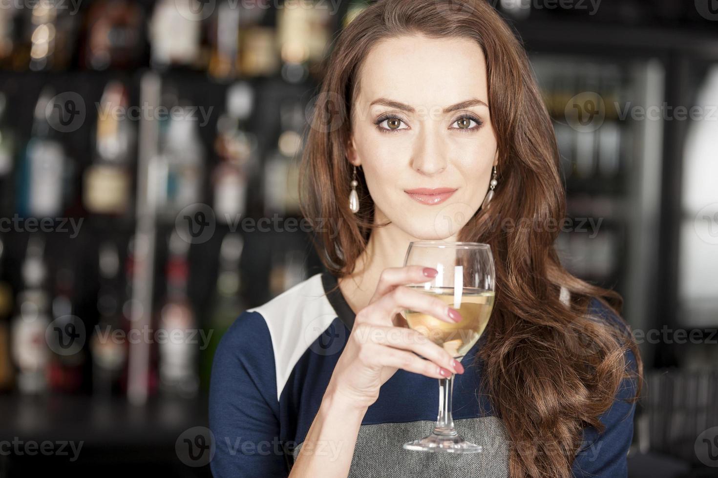 Beautiful woman in wine bar 1385419 Stock Photo at Vecteezy