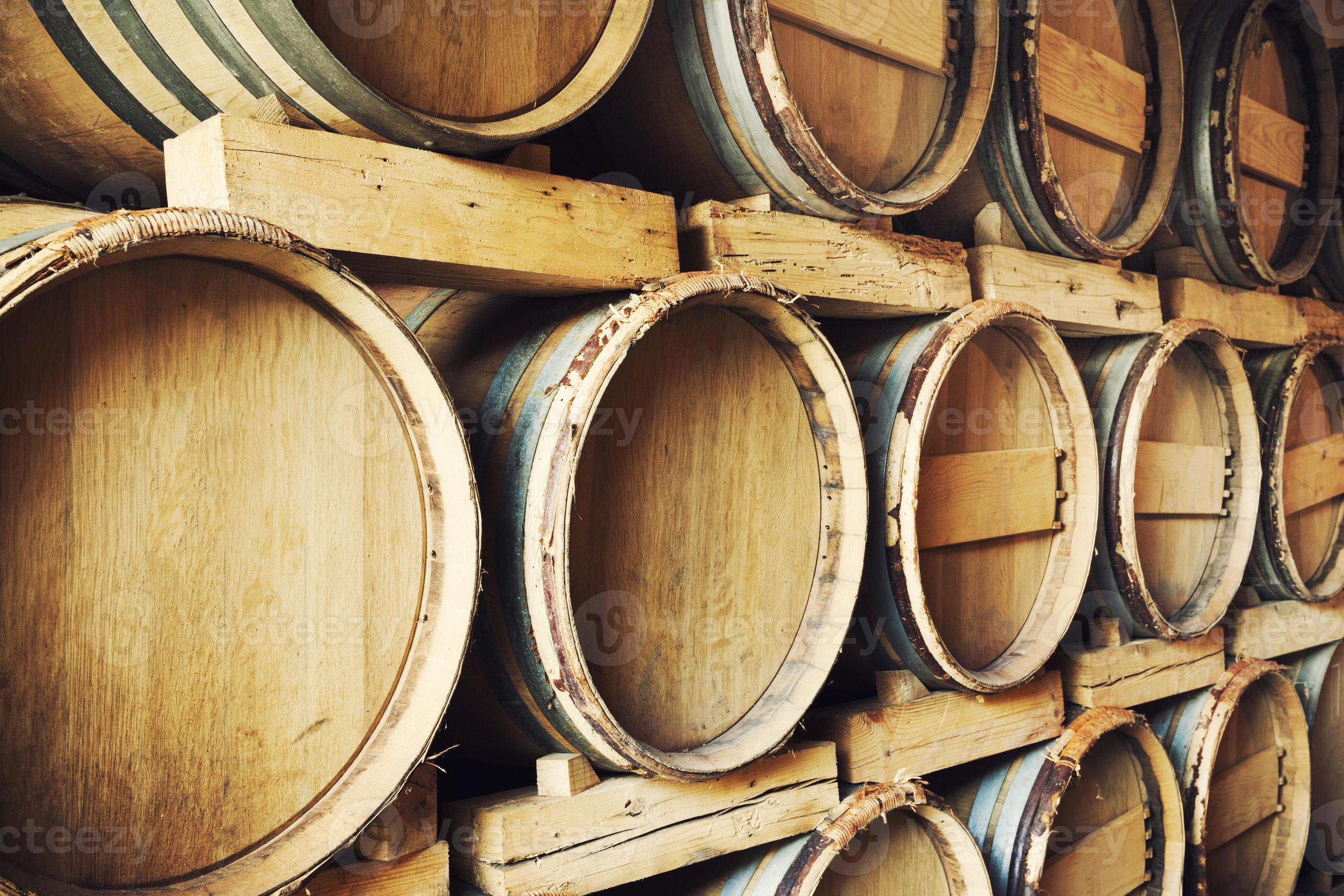 Barrels stacked in a wine cellar 1385692 Stock Photo at Vecteezy