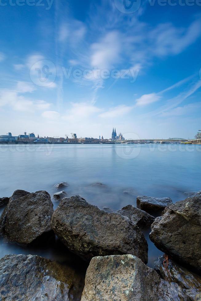 cologne cityskyline with cathedral at the stony rhine shore photo
