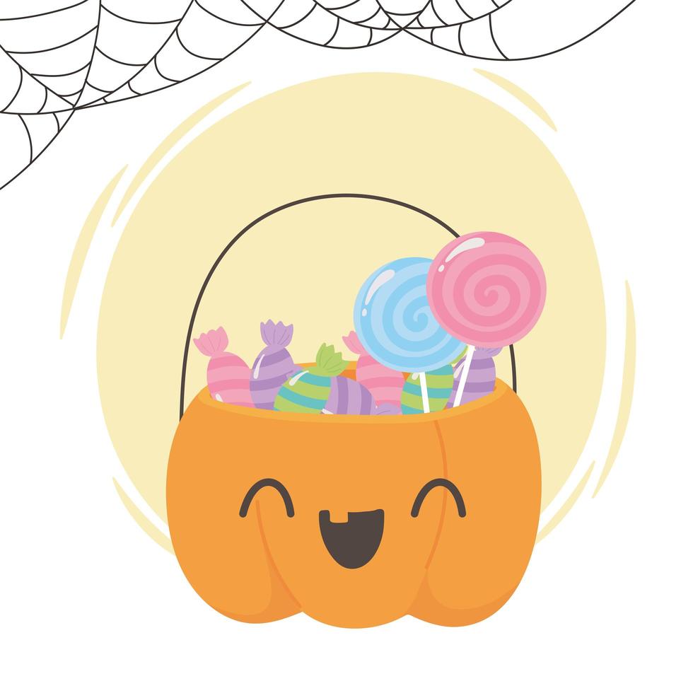 linda canasta en forma de calabaza con dulces vector