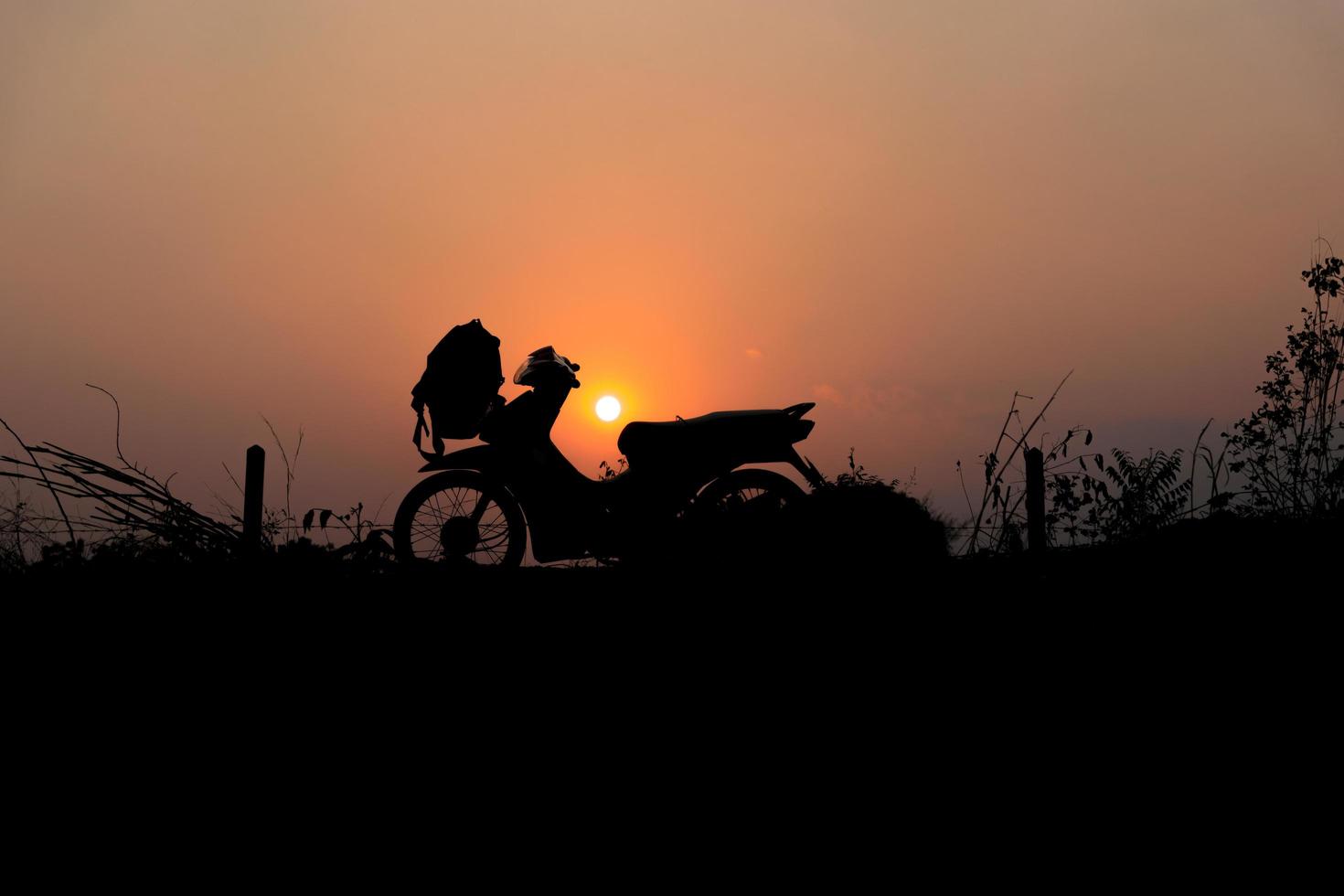 Silhouette of motorcycle photo