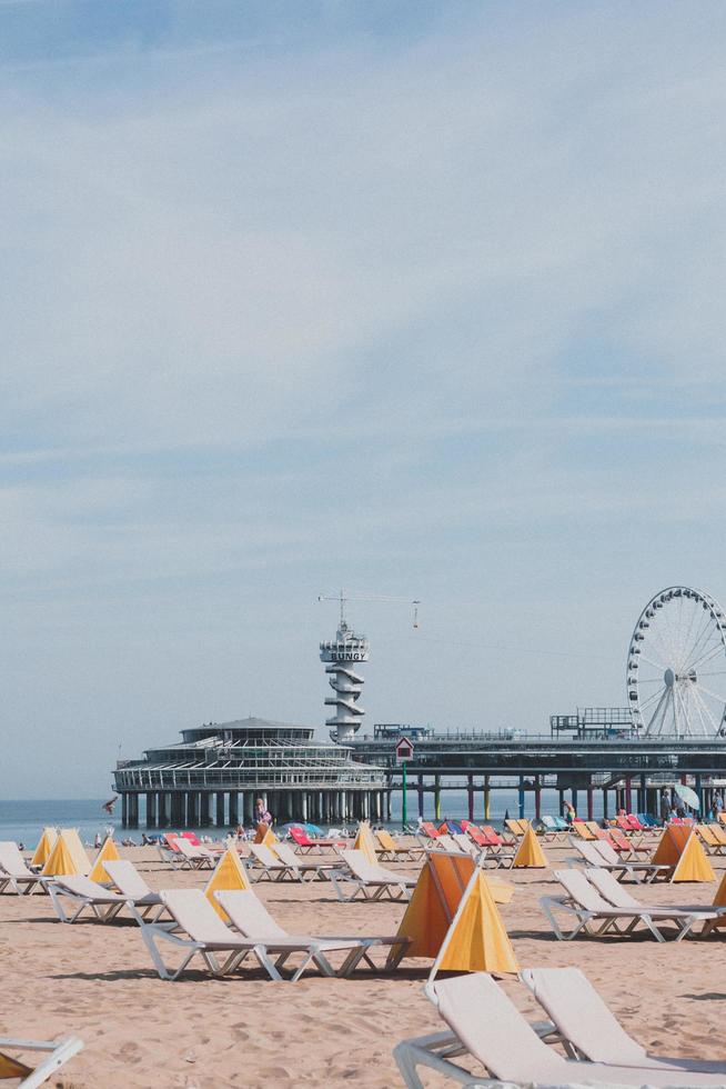 Ferris wheel near body of water during daytime photo