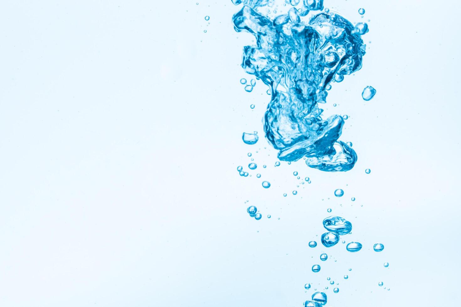 Bubbles in blue water background photo