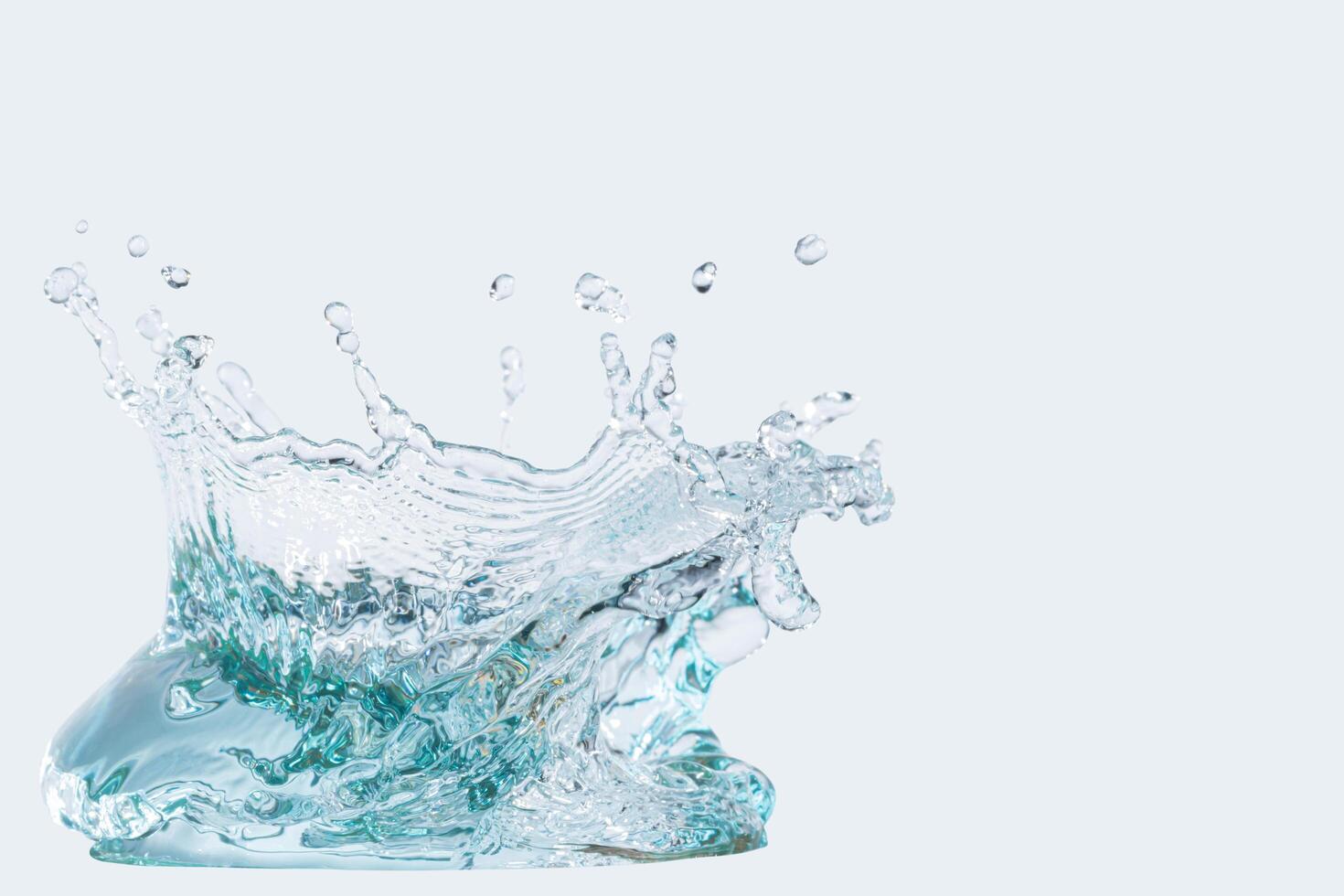 Water splash isolated on white background photo