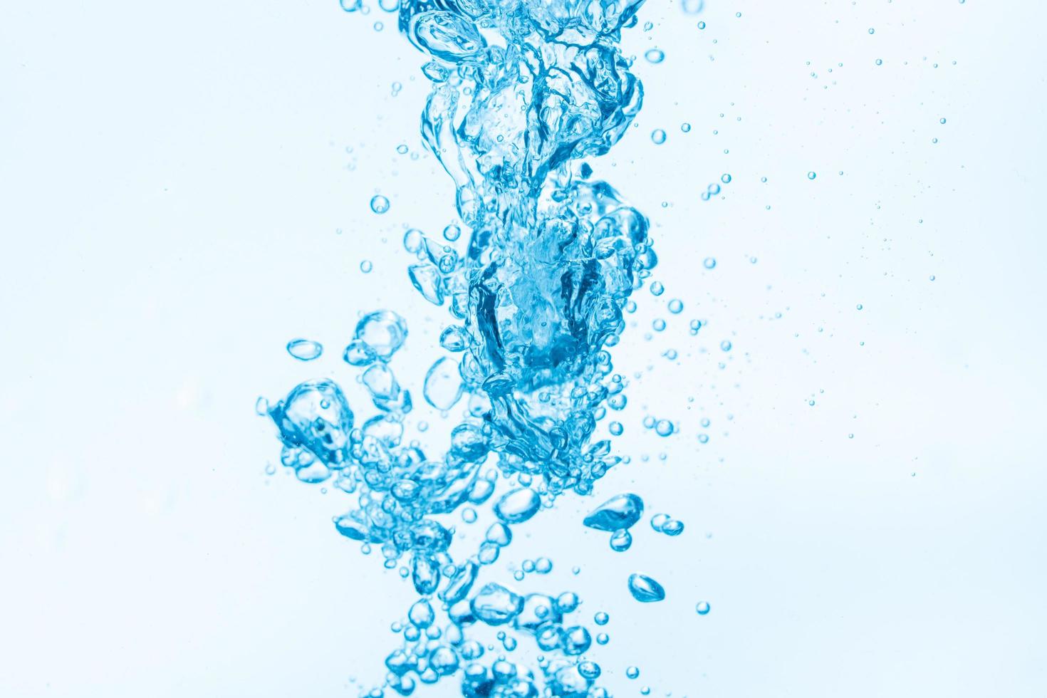 Bubbles in blue water background photo