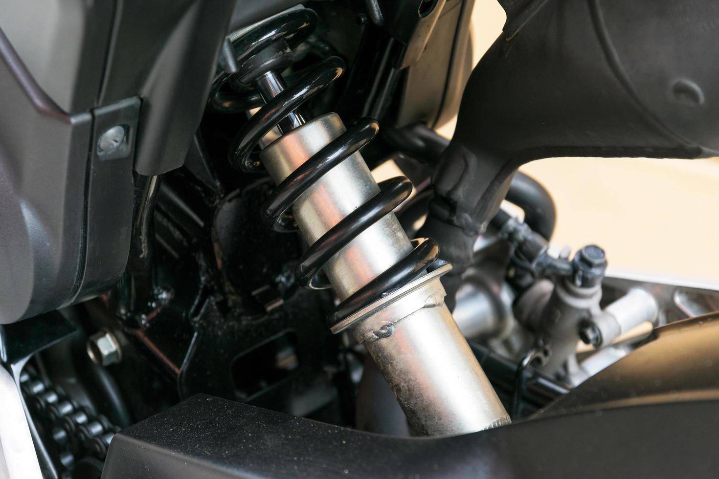 Motorcycle shock absorber a device for absorbing jolts. photo