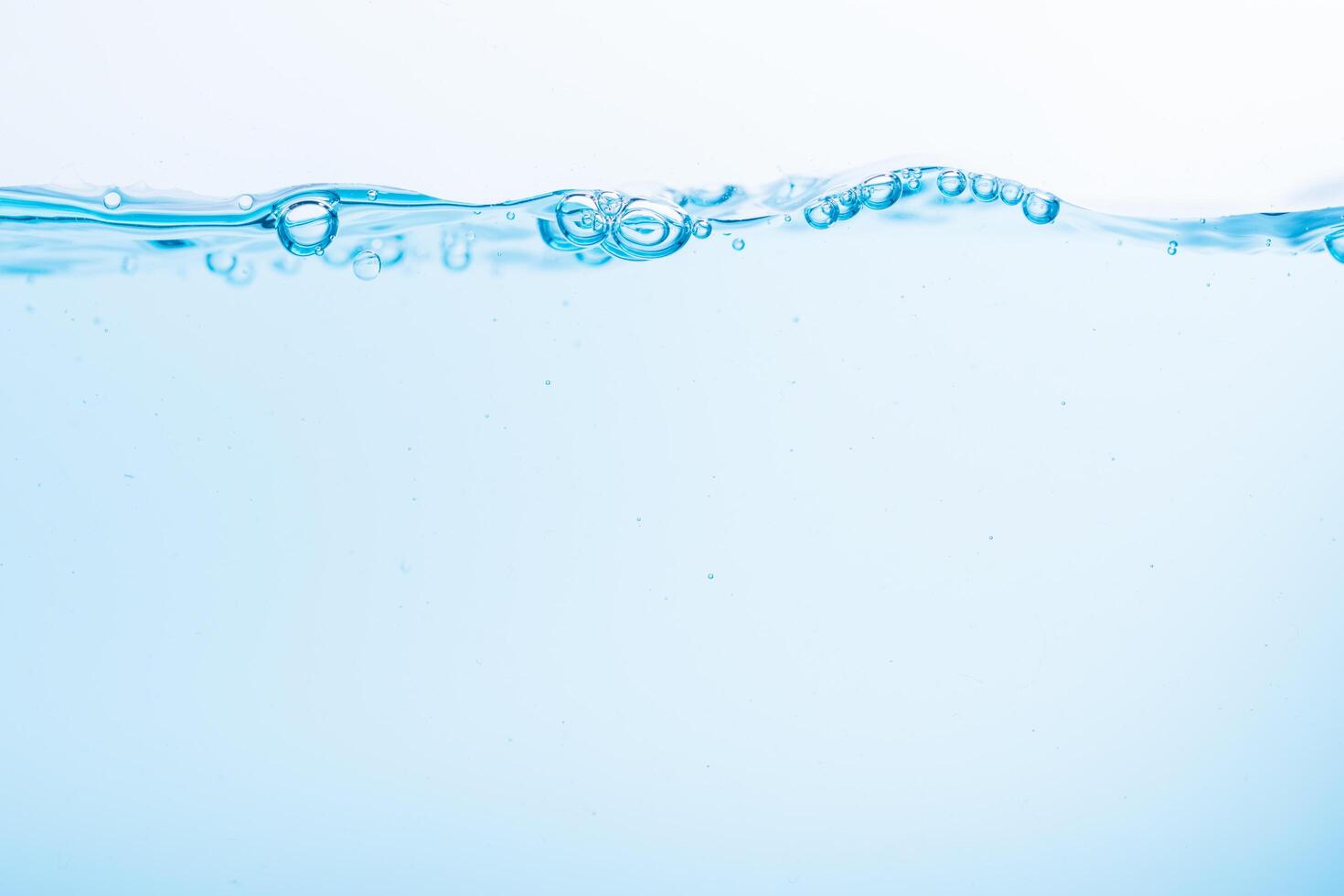 Surface of the blue water on white background photo