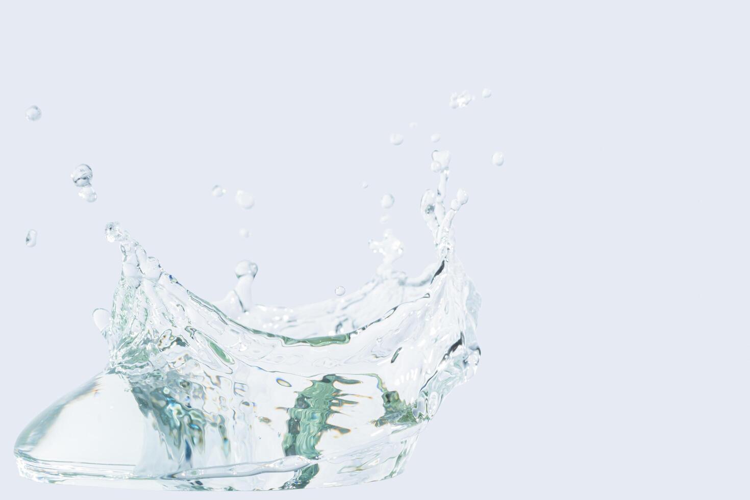 Water splash isolated on white background photo