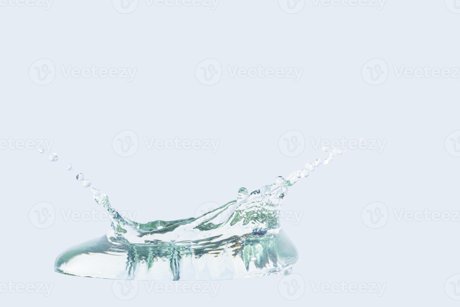 A water drop splashing into the air photo