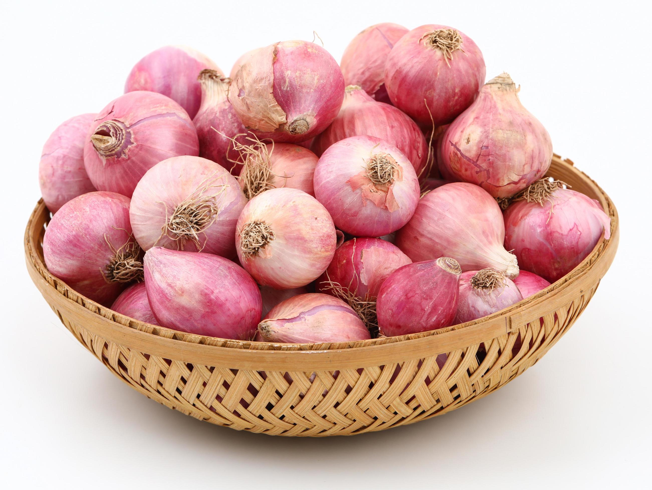 Basket of red onions 1397323 Stock Photo at Vecteezy