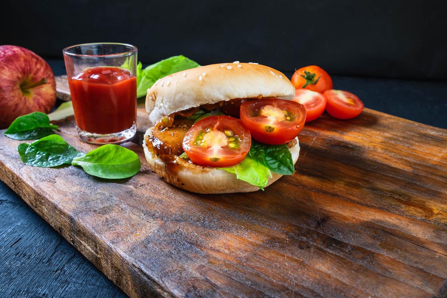 Hamburger with tomatoes and lettuce photo