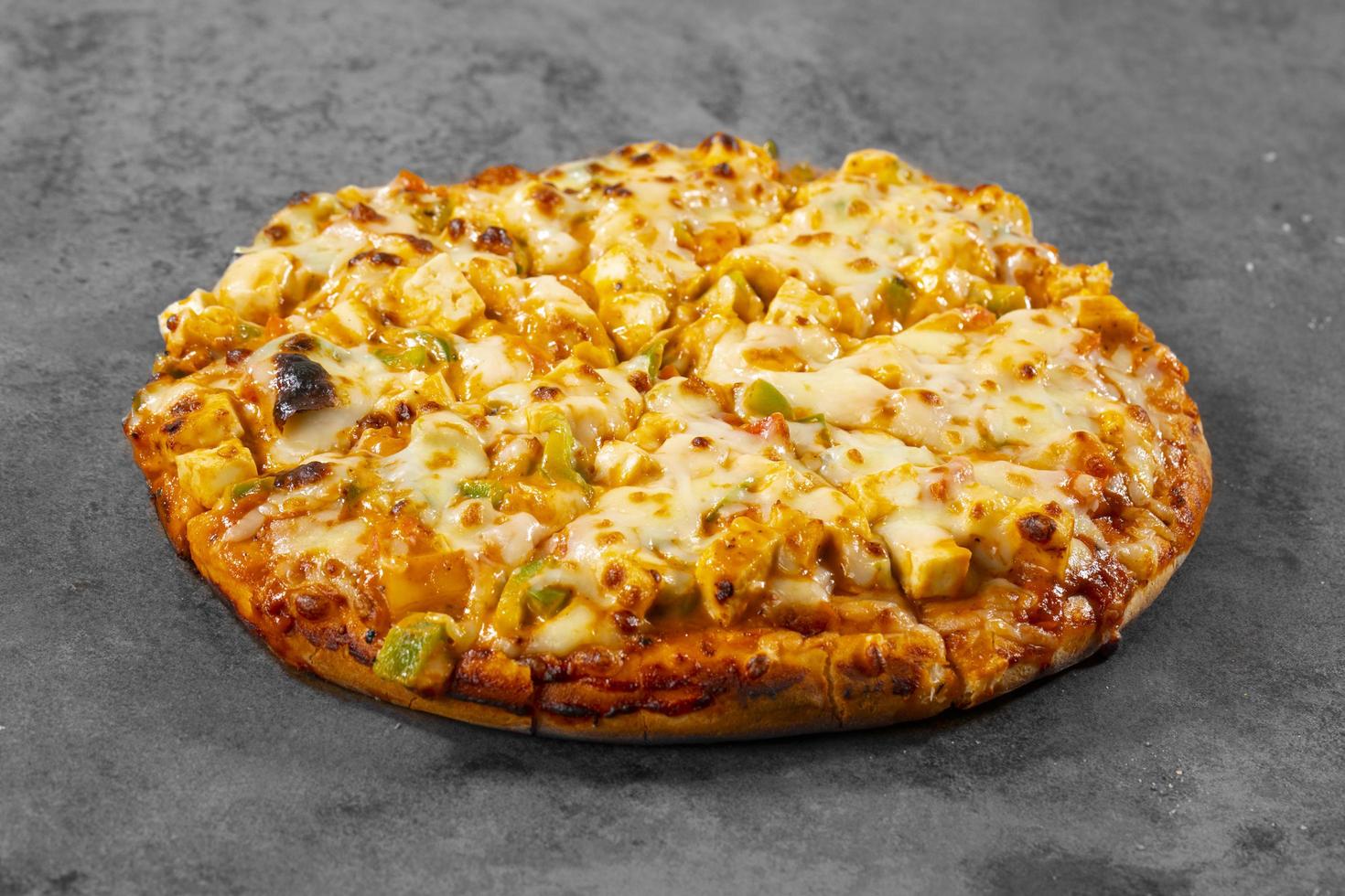 Indian style of Italian dish paneer pizza photo