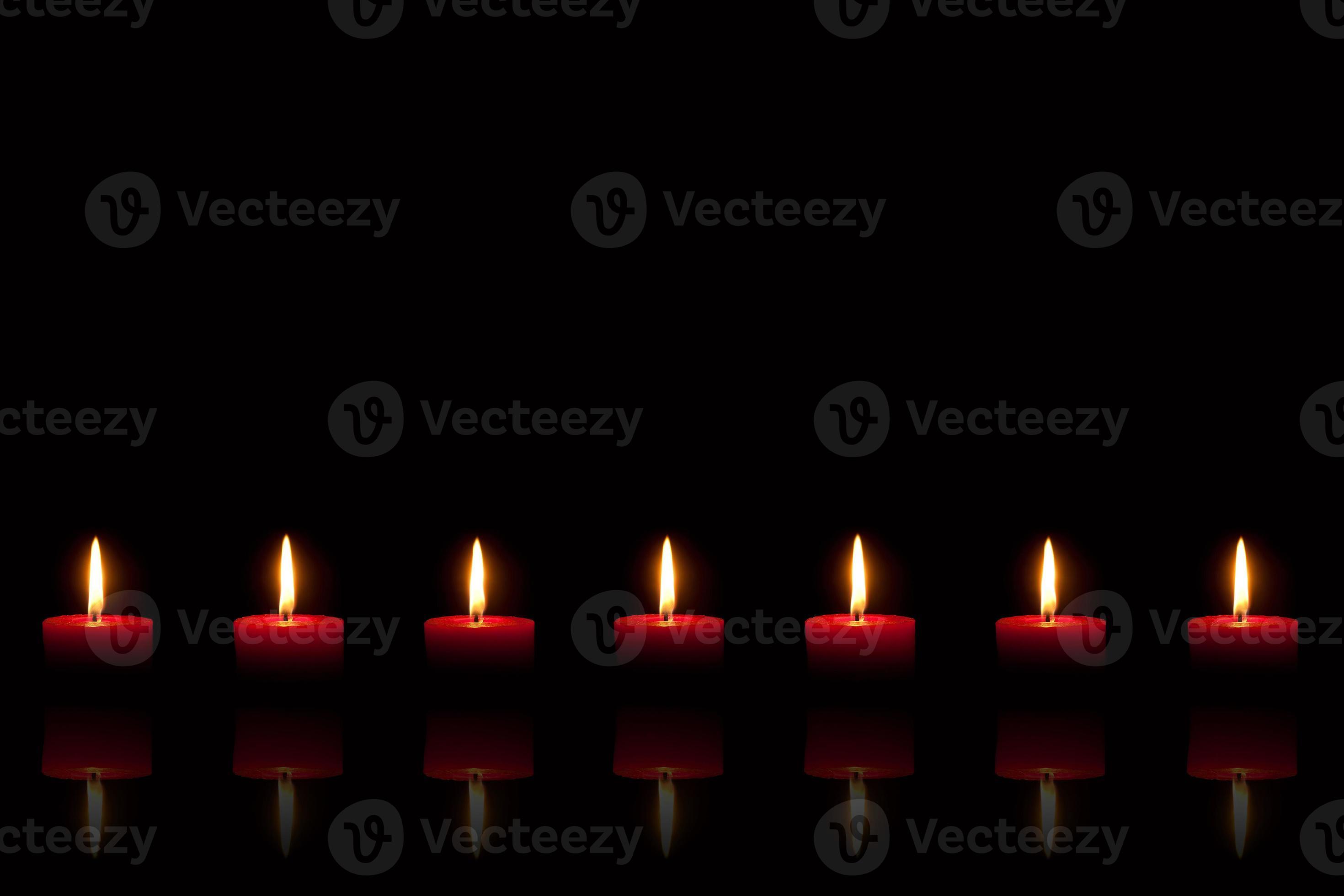 Burning red candles in front of black background 1399246 Stock Photo at