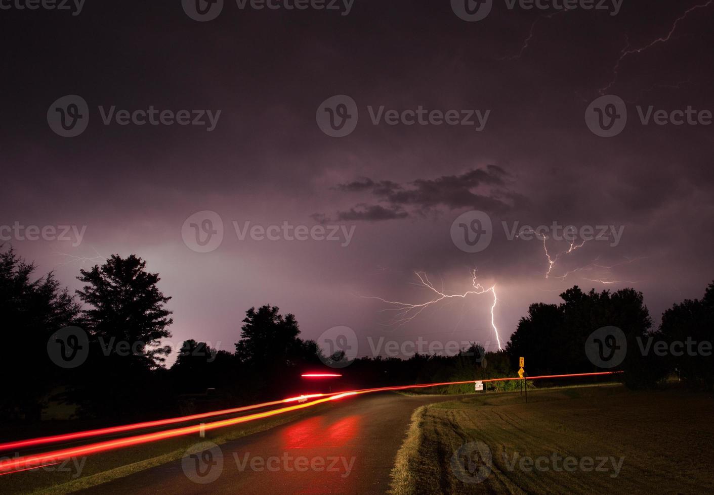 Lightning Strike over car driving. 1400101 Stock Photo at Vecteezy