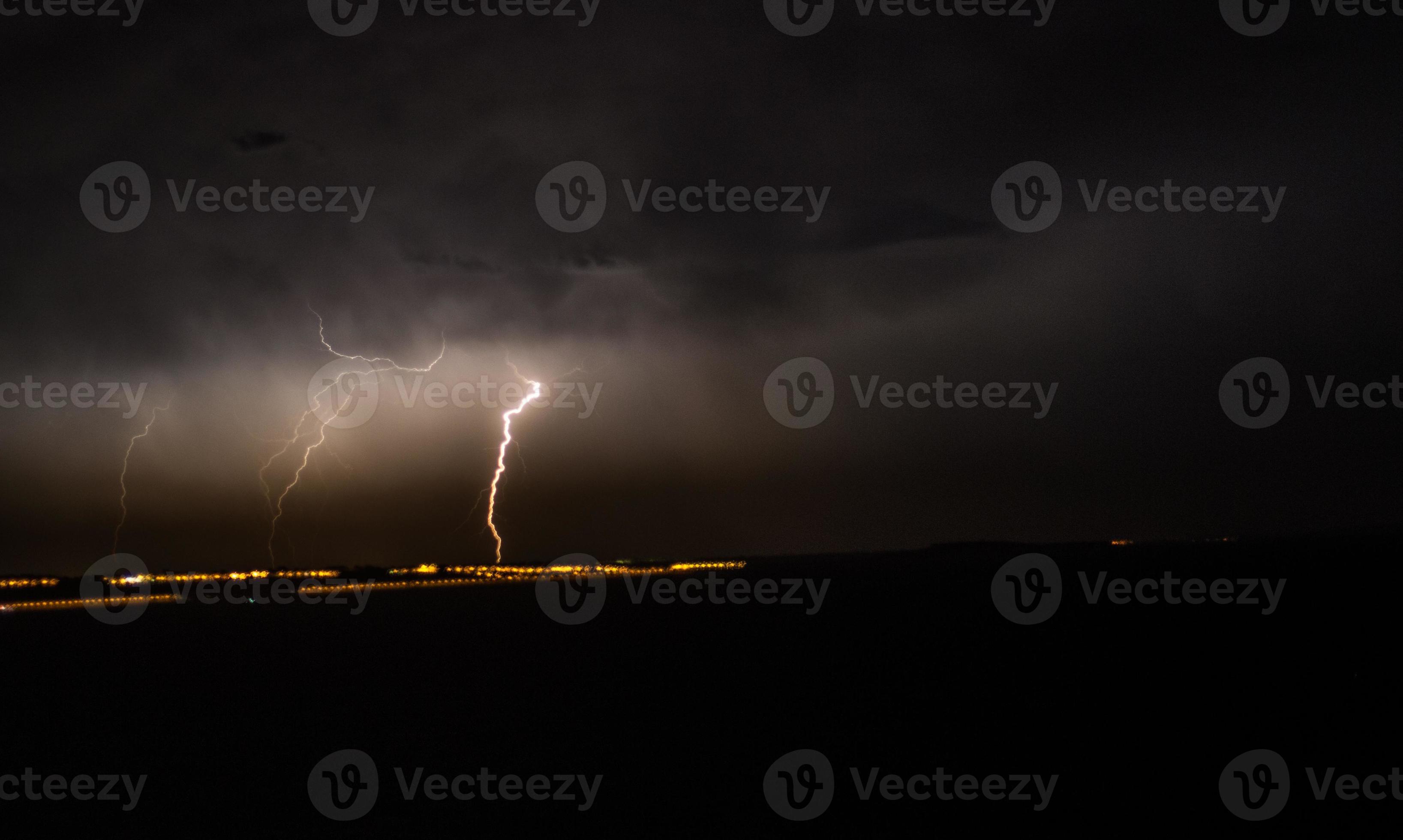 Lightning Strikes Headland With Dark Clouds Stock Photo Lightning Strikes Headland With Dark Clouds Stock Photo