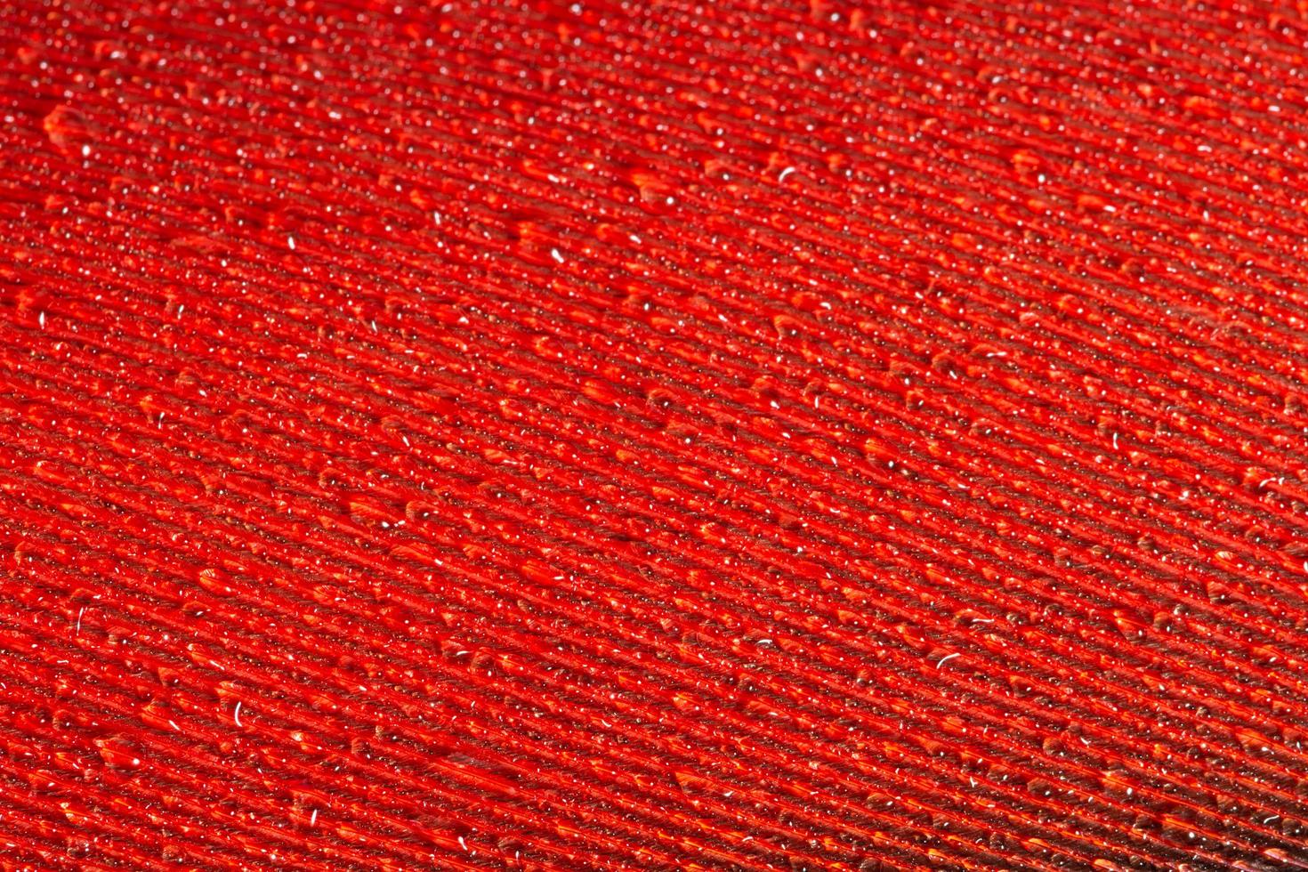 gotas de agua en una pluma foto